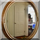 D13. Oval gilt edged mirror 26”h x 24”w 